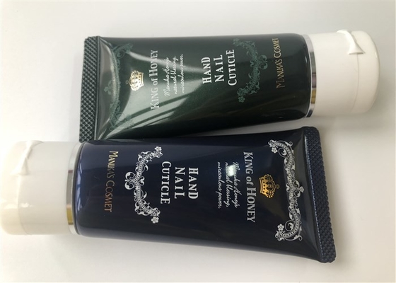 Black and green colored bead tube Hand Nail Cuticle 2 color screen printing hot stamping gold band Flip top cap 50g